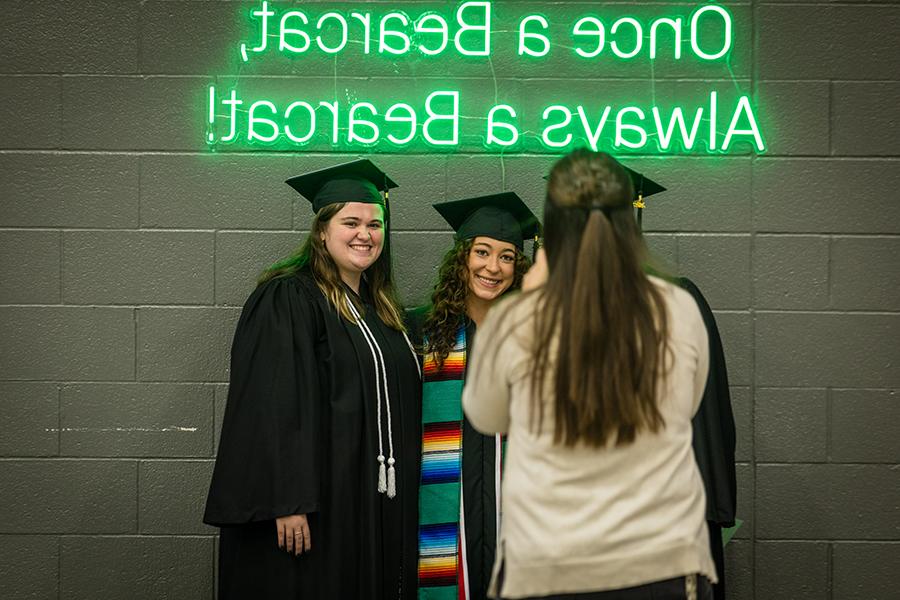 Northwest graduates took time for photos before the University's winter commencement ceremonies in December. (Photo by Lauren Adams/Northwest Missouri State University)